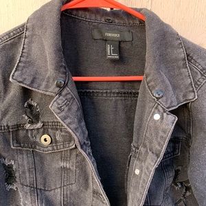 Black ripped denim jacket